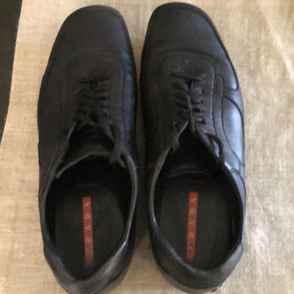 Authentic Prada men's black leather sneakers